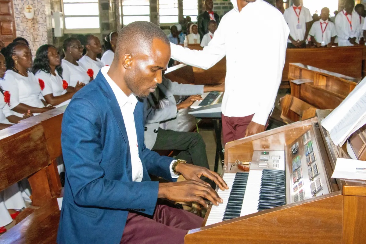 The choir’s organist during Mass
